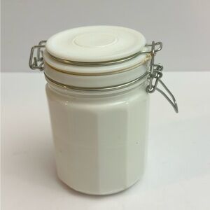 Vintage white milk glass storage jar w/ a wire bail closure & a 12-sided design